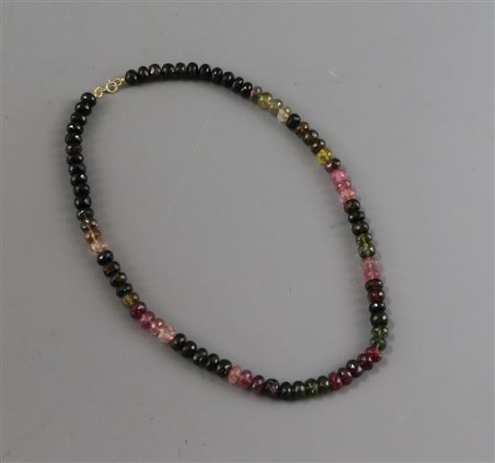 A modern single strand multi coloured facet cut tourmaline necklace, with 18ct clasp, 42cm.
